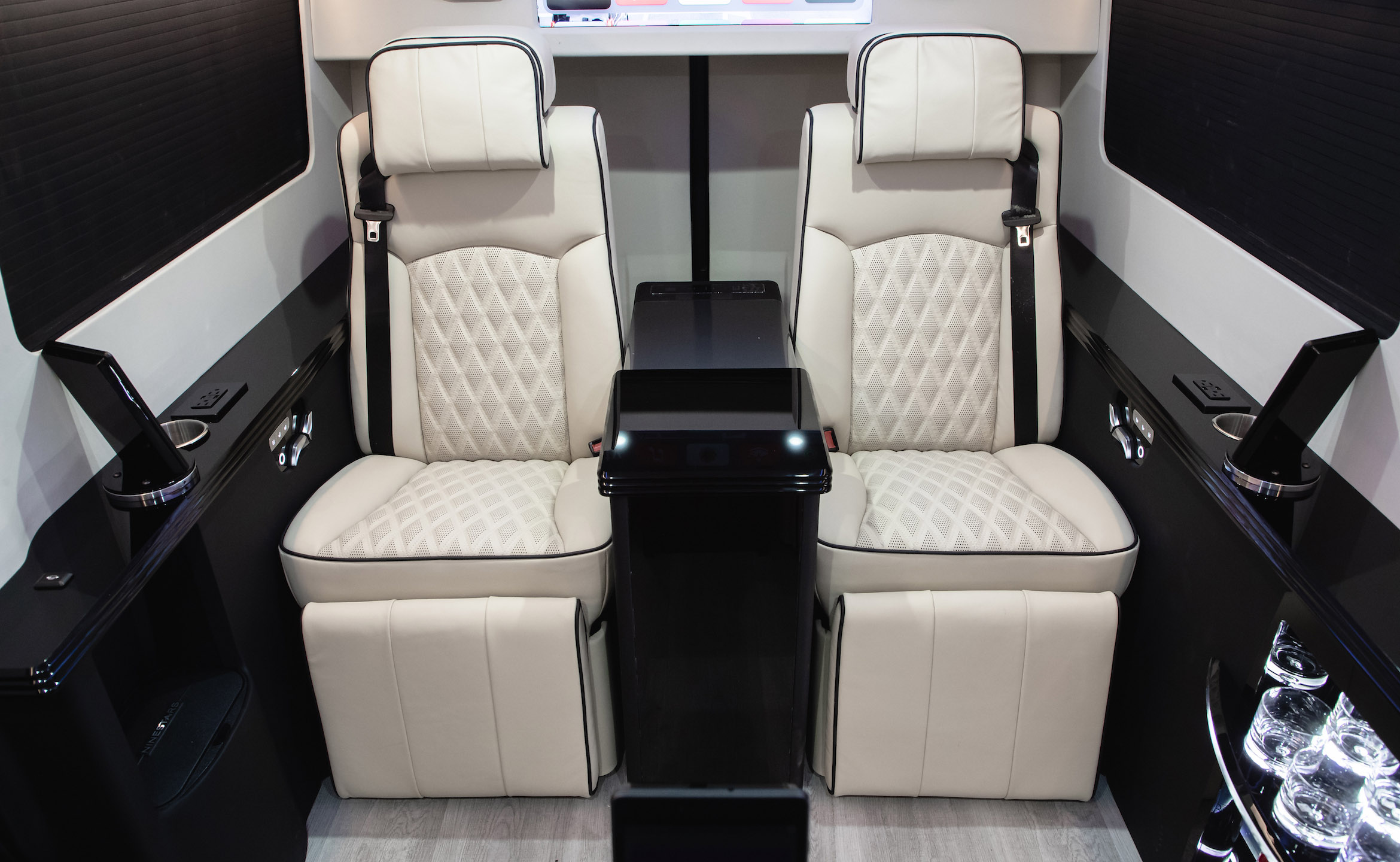 Custom Interior Bespoke Mercedes Benz Luxury Sprinter Van Conversion, Bathroom, & Luxury Mobile Offices.